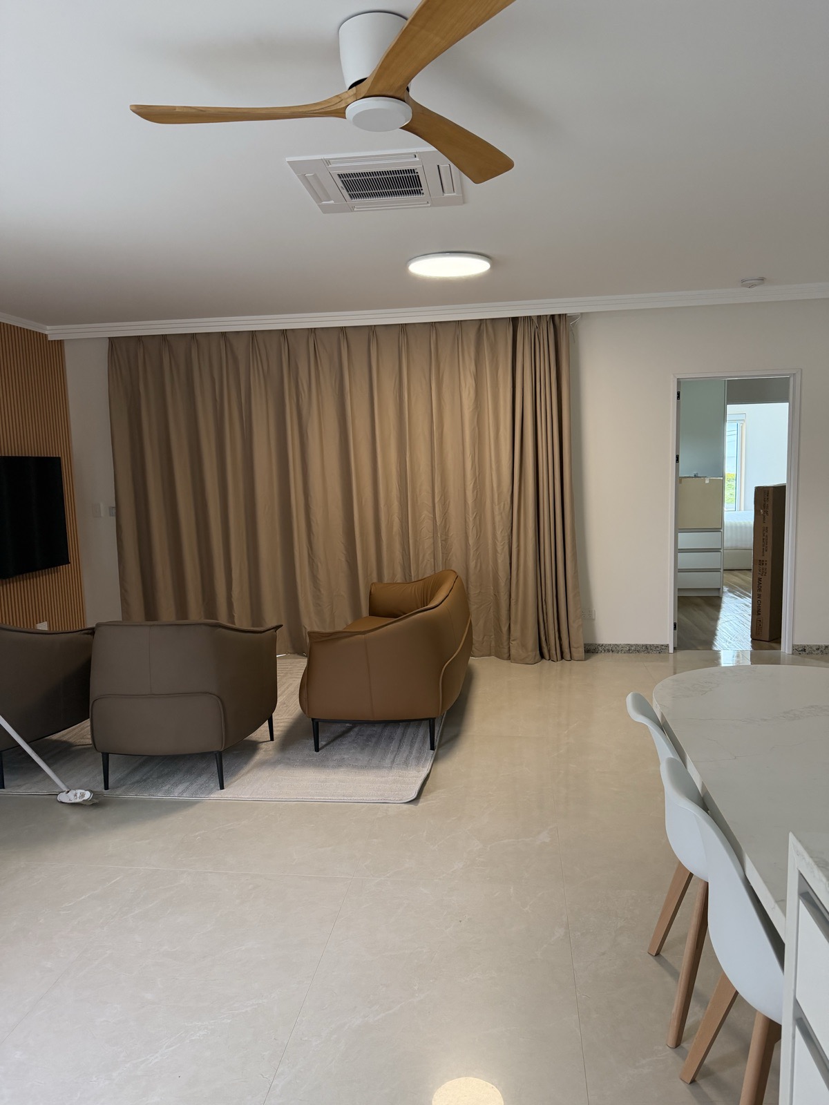 Living and kitchen area of a newly built home after a final construction clean