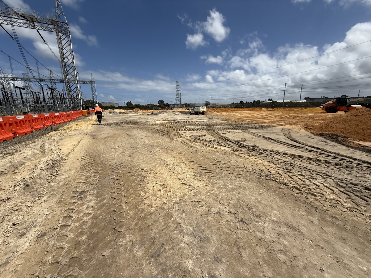 Earthworks and site preparation alongside a substation